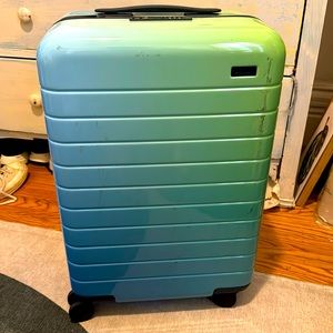 Limited edition AWAY suitcase - used but in fair condition.